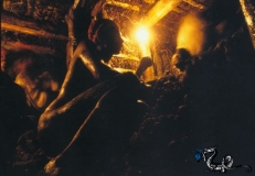 Miner at work deep in the pit